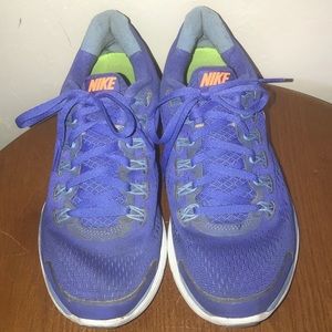 Orange and blue nike tennis shoes